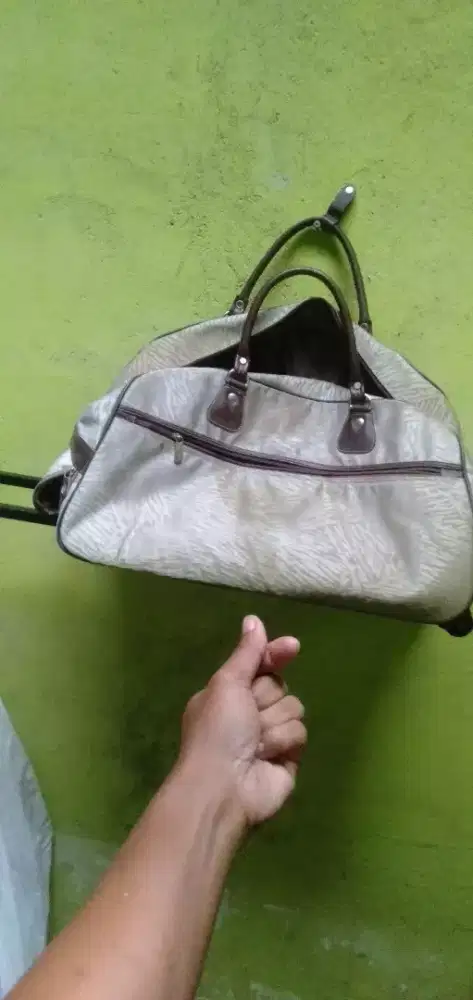 Di jual tas jinjing ,tas koper  original,asli ada roda dan tangkai