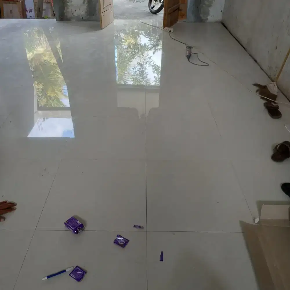 pemasangan keramik granit dan batu alam terima jadi bahan terpasang