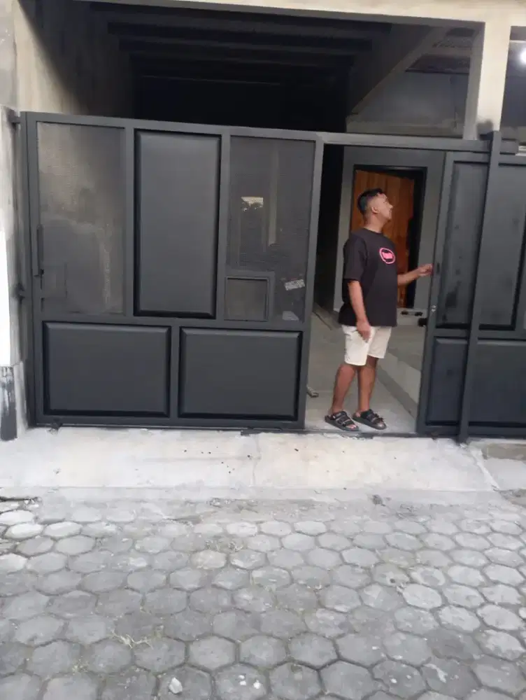 Pintu pagar motip porporated dobel sleding