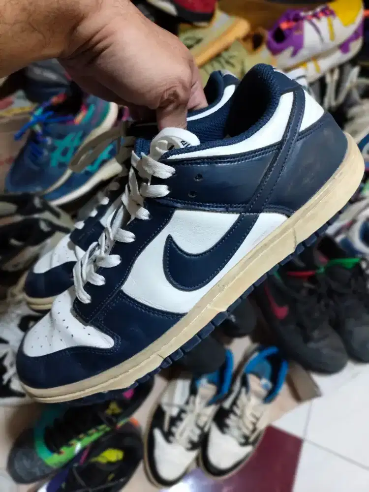Air Jordan 1 low vintage navy, size 43 (tag blur)