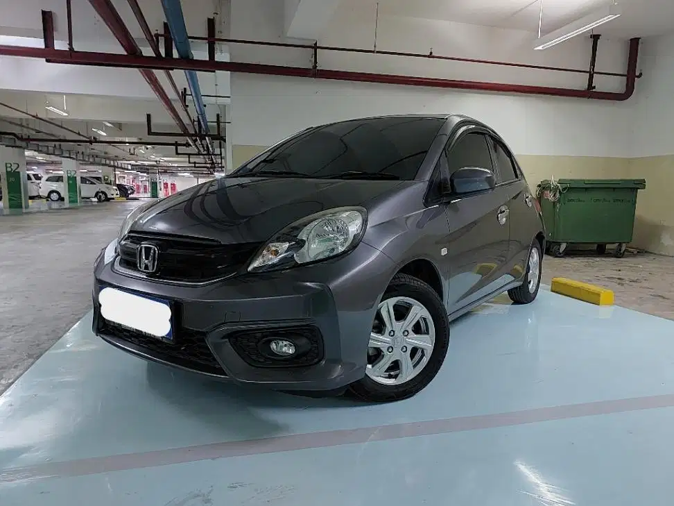 DP MURAH Honda Brio Satya 1.2 E Bensin-MT 2017 Abu CAFID