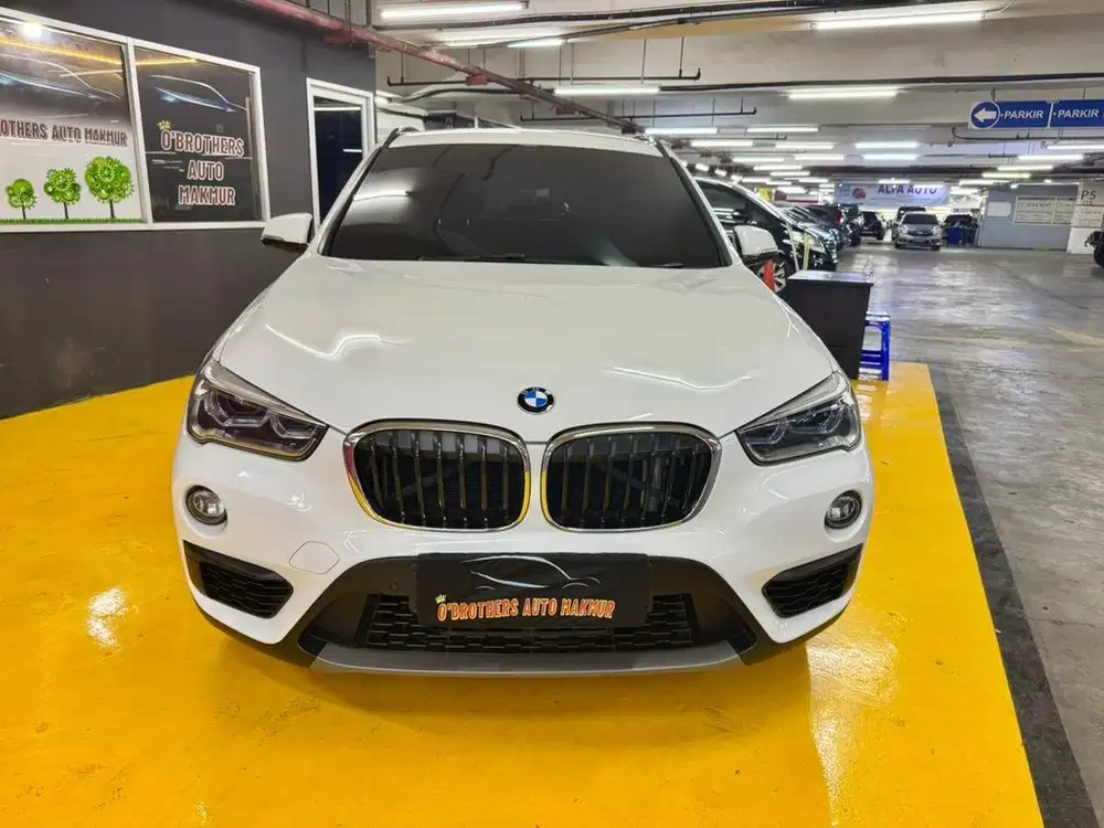 TERMURAH BMW X1 SDRIVE MATIC AT 2018 PUTIH (LOW KM)