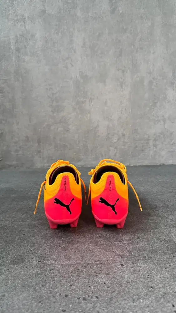 SEPATU BOLA PUMA - ULTRA ULTIMATE FG/AG SUN STREAM/BLK