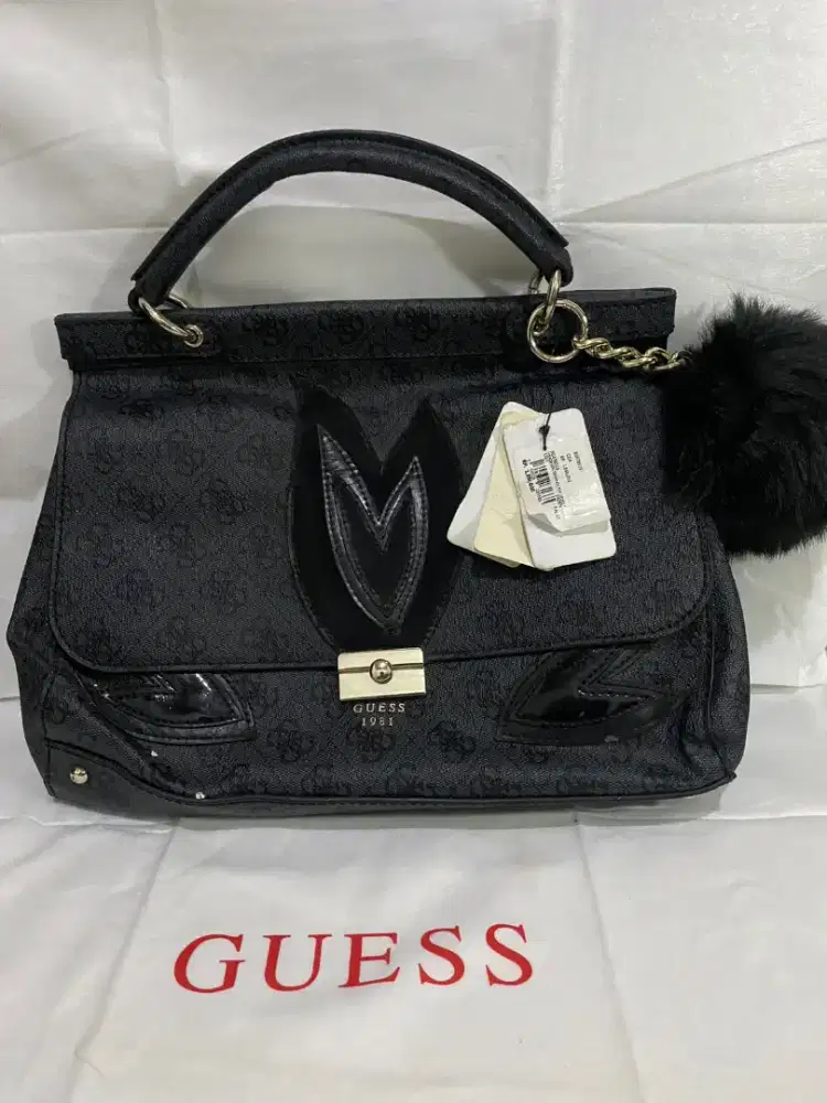 TAS GUESS ORIGINAL