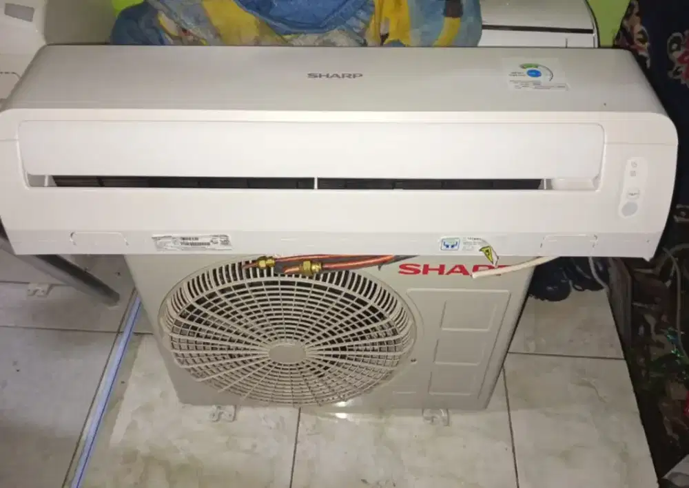 Sharp 1/2 pk include pasang 1.900.000