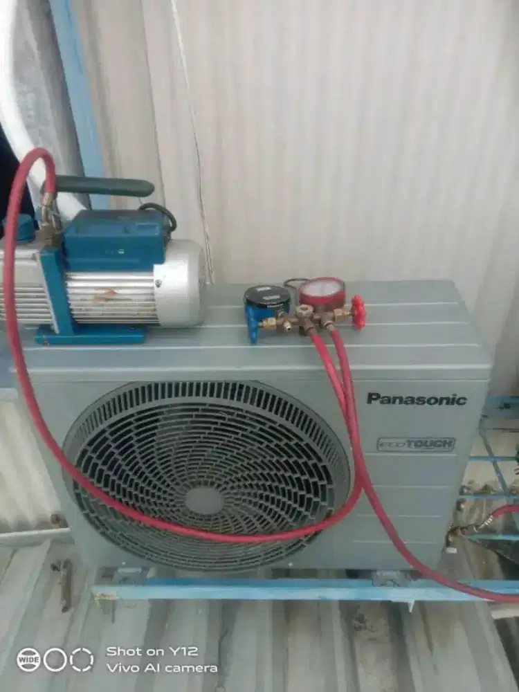 Service AC kulkas mesin cuci pompa air dan lain lain