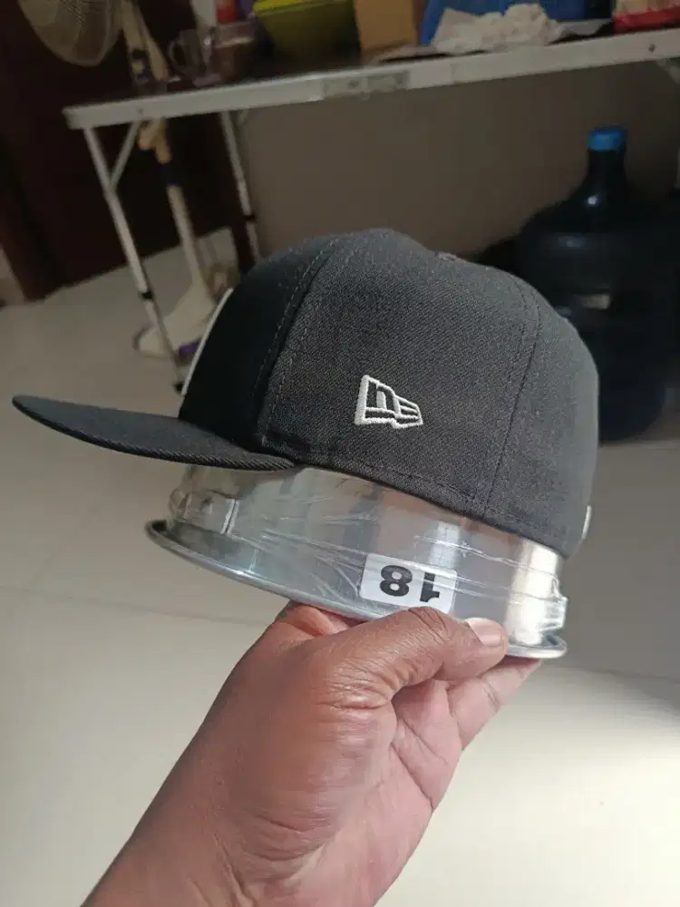 Topi new era bill up