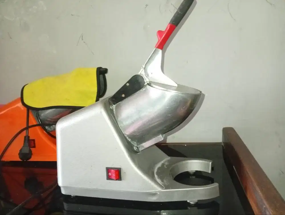 Mesin serut es batu listrik advance