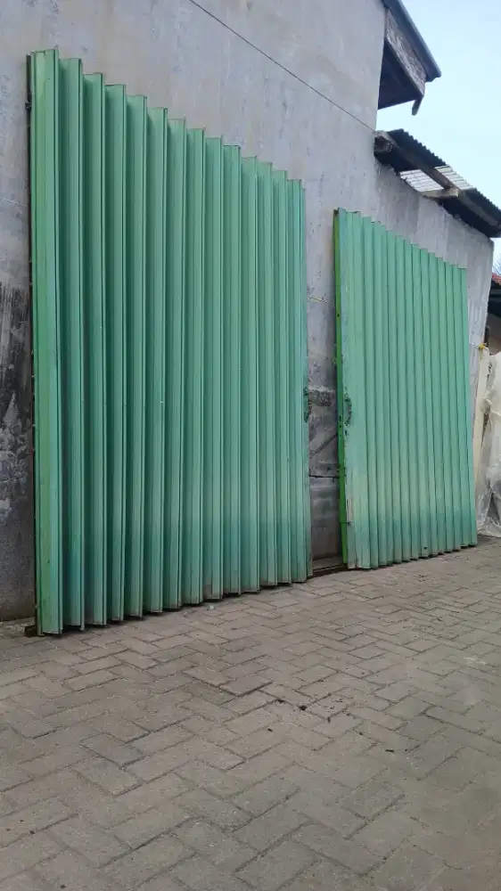 Pintu folding gate bekas daun aluminium