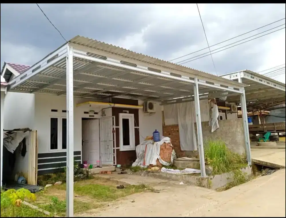 Pemasangan canopy baja minimalis dan atap rumah