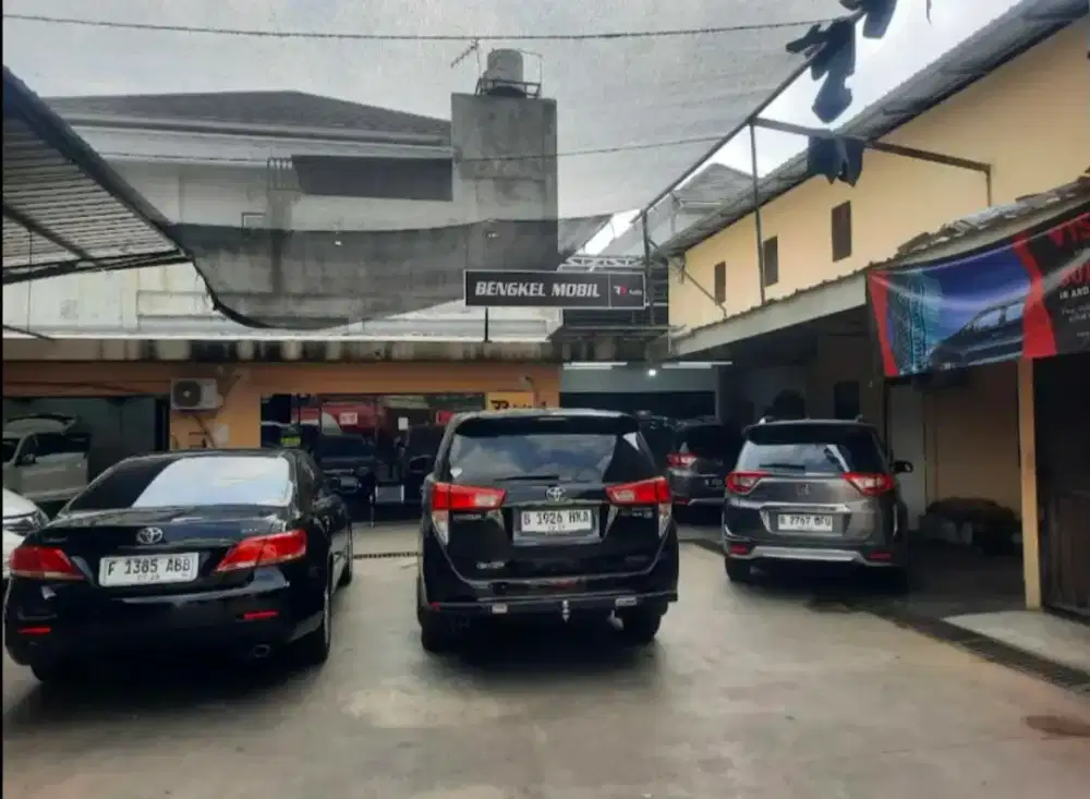 Over usaha bengkel mobil