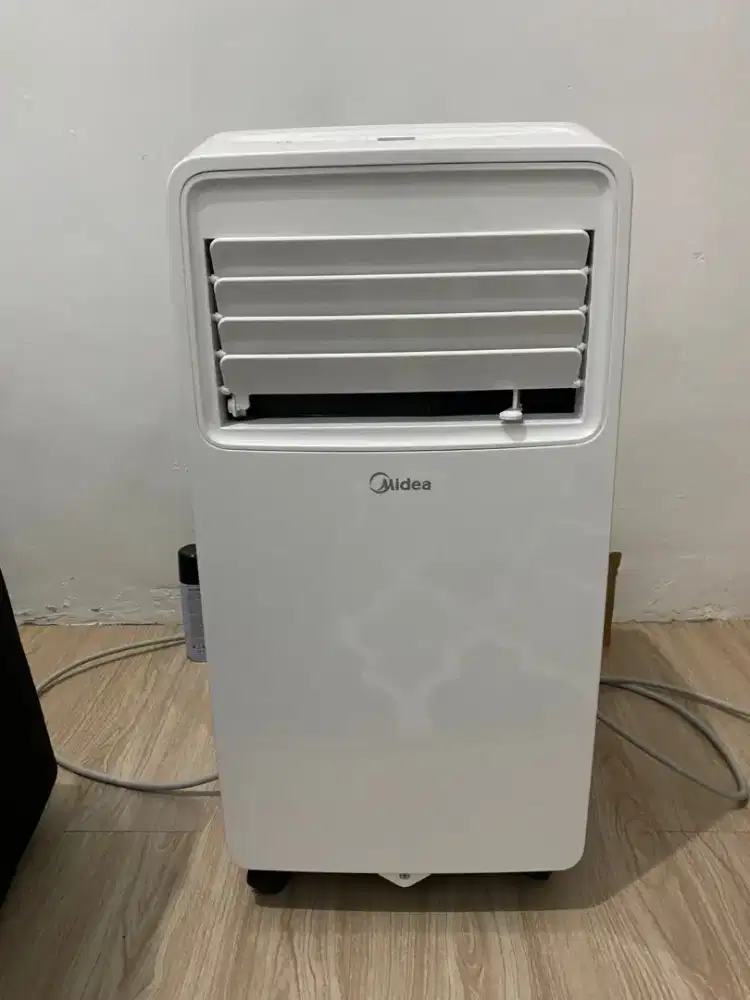 AC Midea 1/2 PK (bukan air cooler)