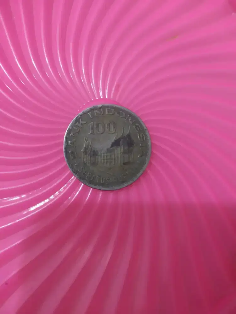 Mahar koin seratus rupiah...