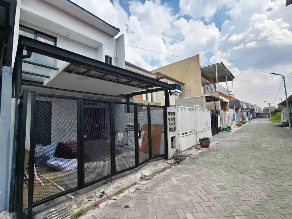Rumah 2 LT Full Renov dekat Raya Merr