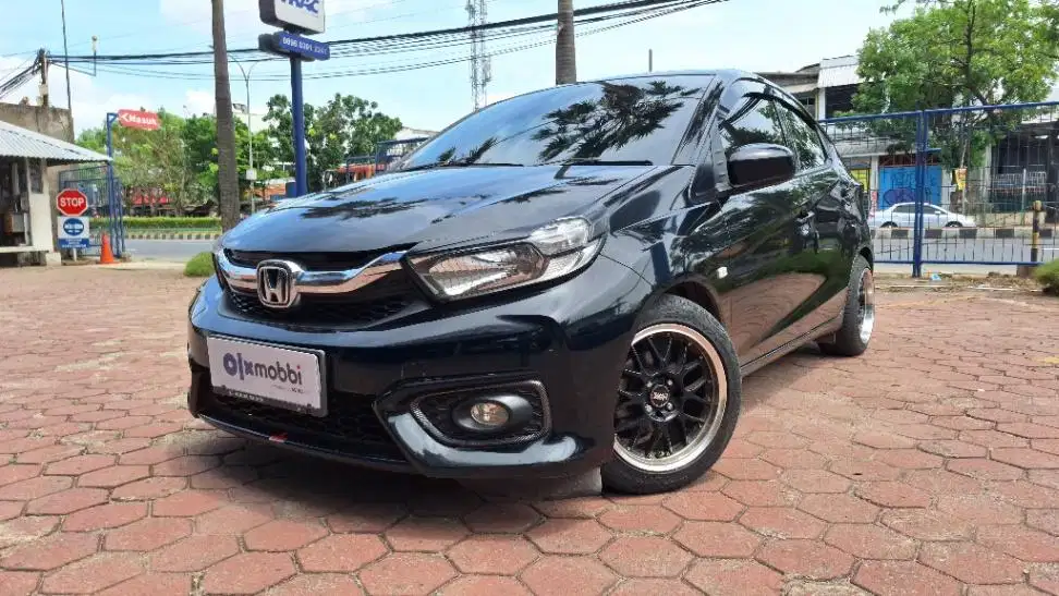 DP MURAH Honda Brio Satya 1.2 E Bensin-AT 2019 Hitam CAHYD