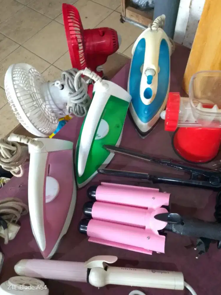 Strika gosokan baju bekas murah