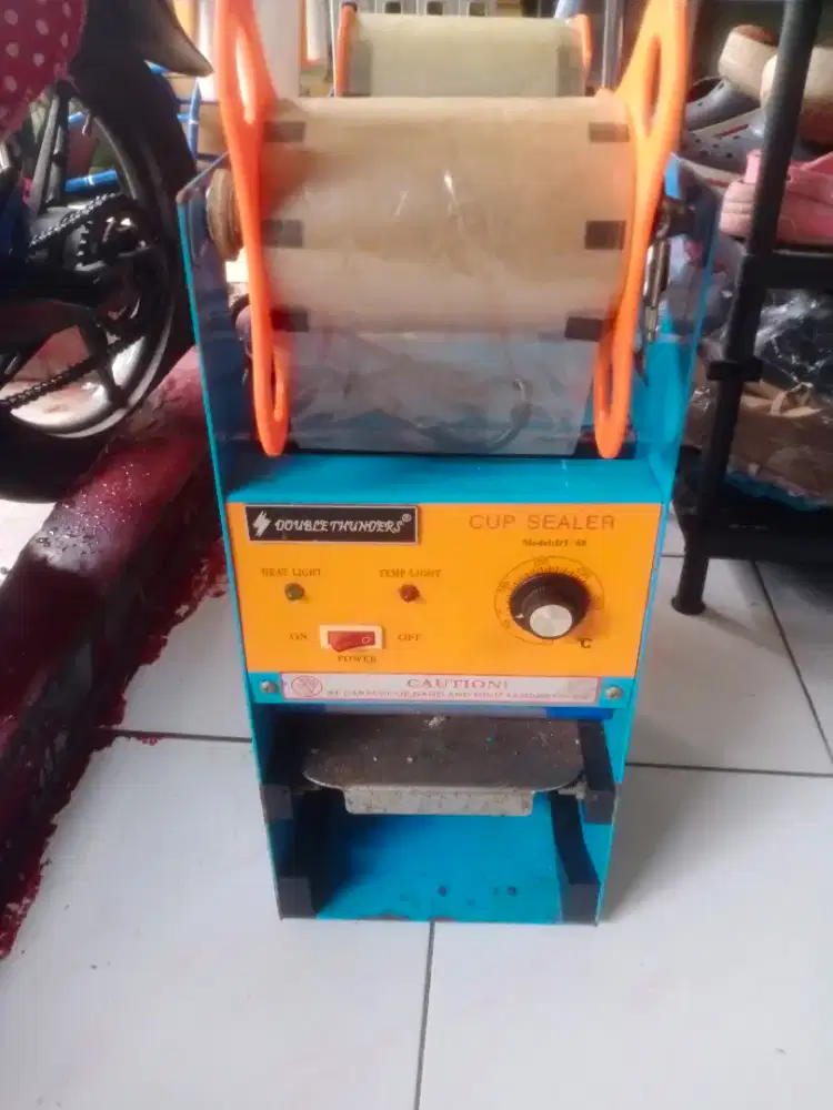 Mesin press cup merk dobel thunder