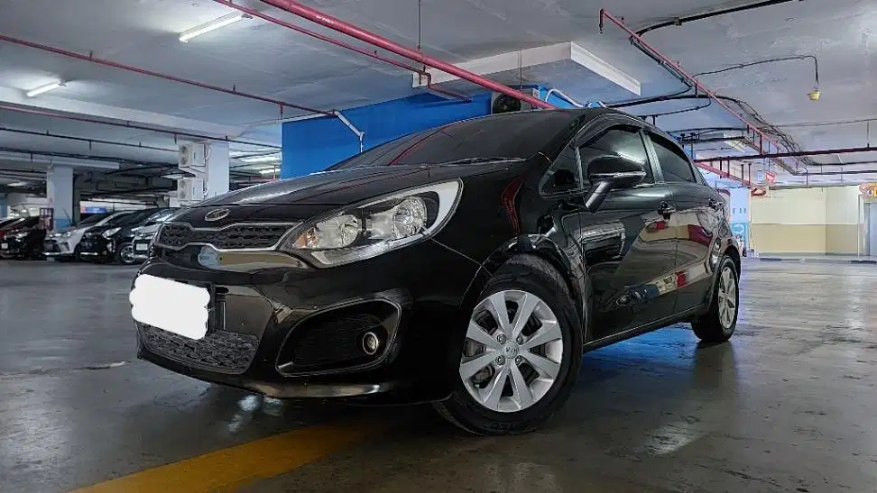 DP MURAH Kia Rio 1.4 SE Bensin-AT 2012 Hitam CSZMB