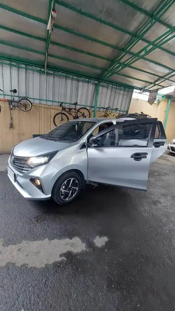 DP 9 JT Daihatsu Sigra R Deluxe Matic 2023 Like New