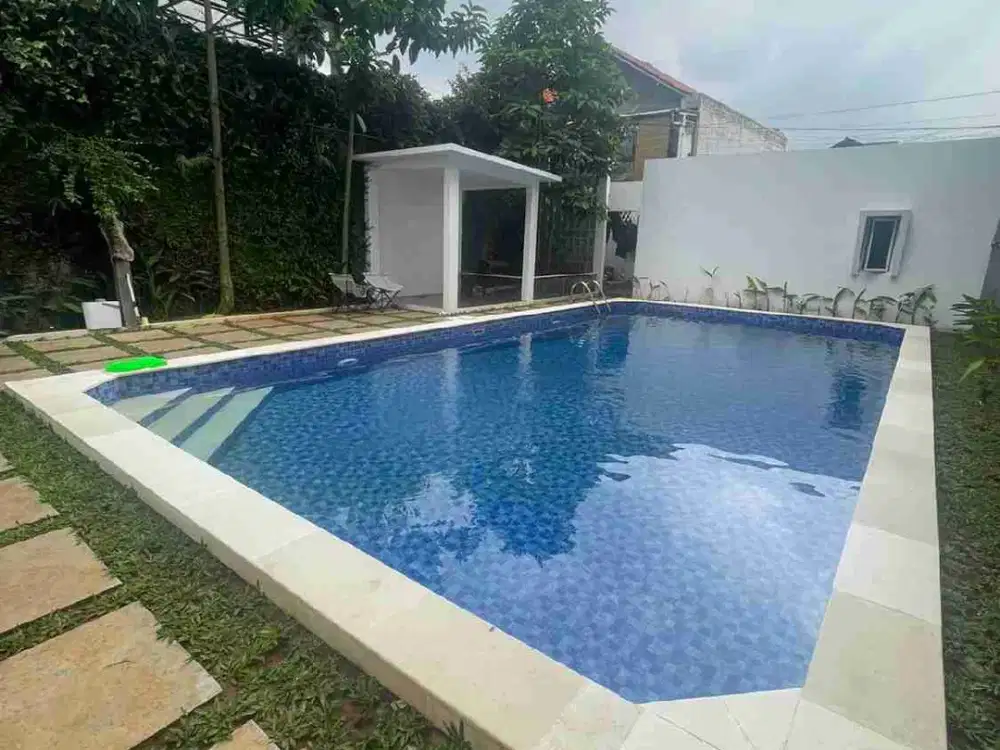 DISEWAKAN RUMAH DENGAN KOLAM RENANG PONDOK LABU JAKARTA SELATAN