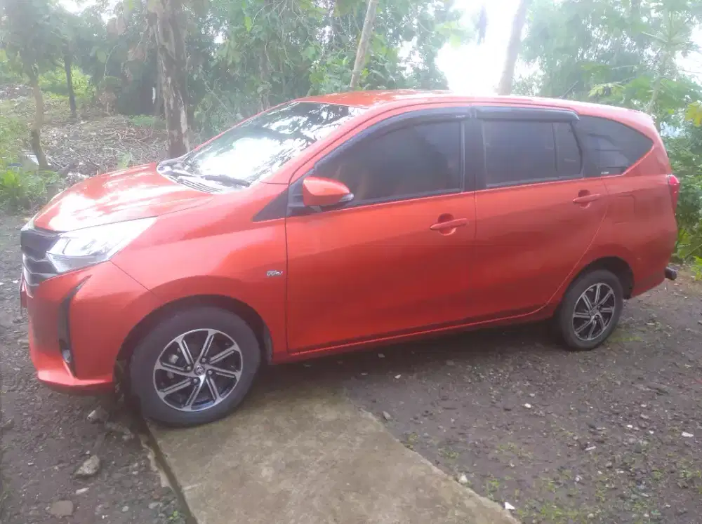 Dijual cepat mobil calya warna orange, cover jog masih orisinil