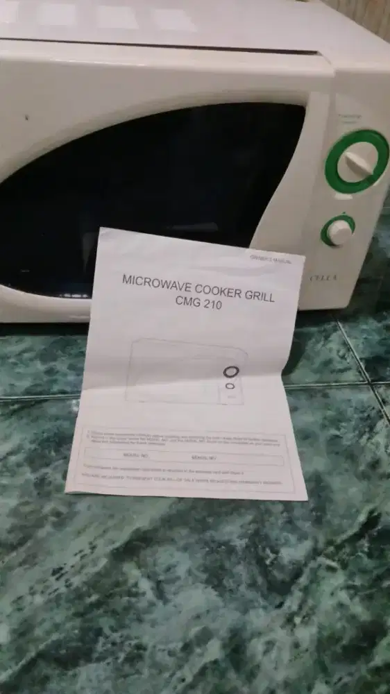 Microwave bekas sperti baru