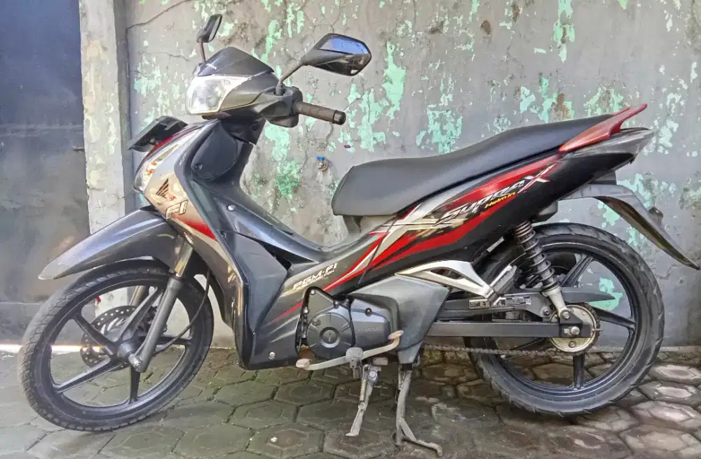 Honda Supra x 125 pgm fi helm in