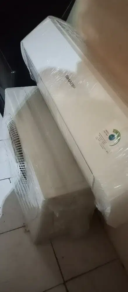 AC SHARP 1/2 pk,masih gress ori