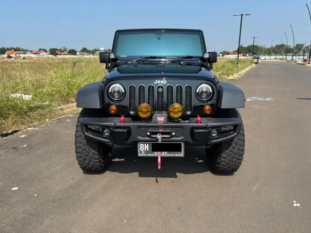 Jeep Wrangler Unlimited Rubicon A/T 3600 CC Bensin. Tahun 2013