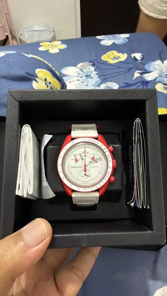 Swatch omega like new