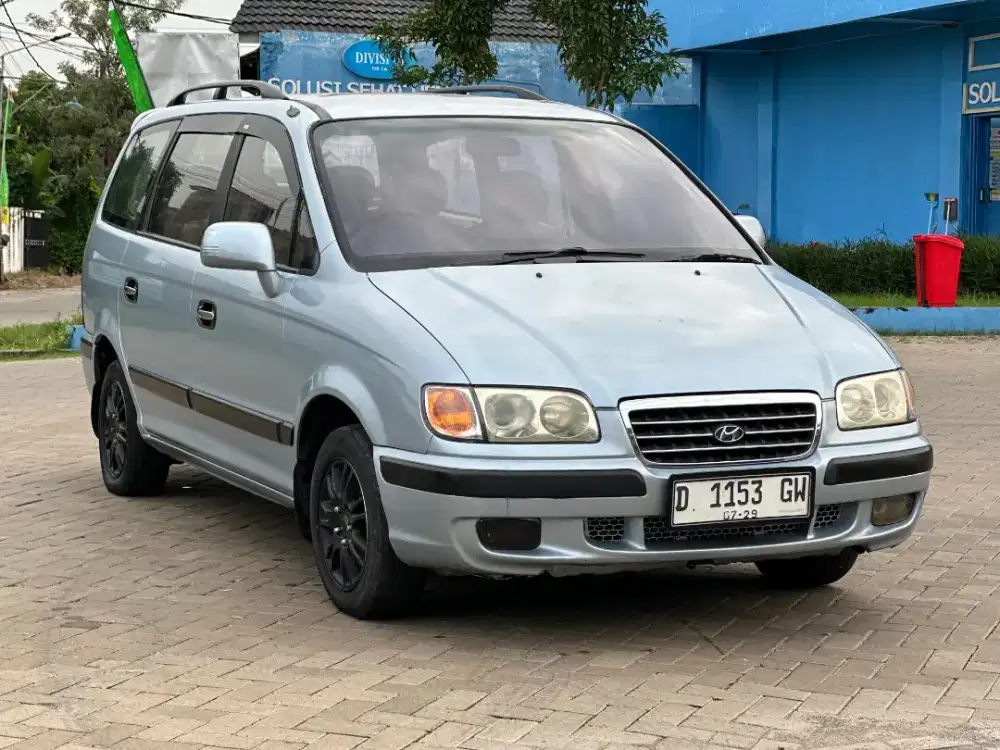 Hyundai trajet tahun 2004 manual