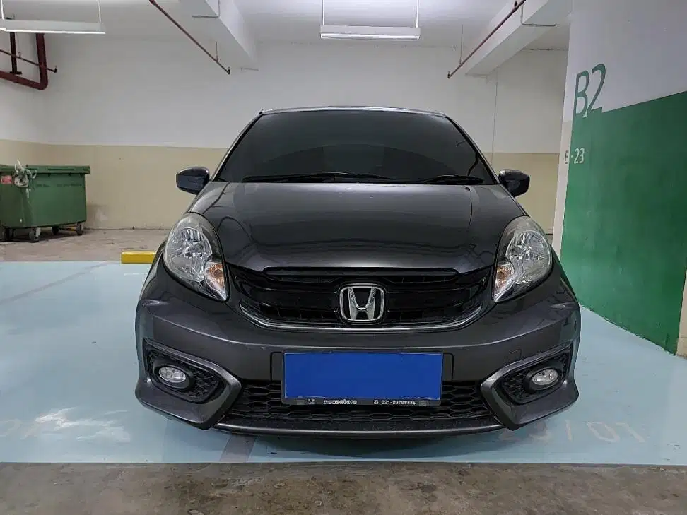 DP MURAH Honda Brio Satya 1.2 E Bensin-MT 2017 Abu CAFID