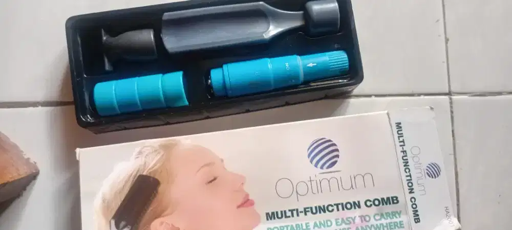 Alat Terapi Pijat Elektrik Portable Multifuction Comb