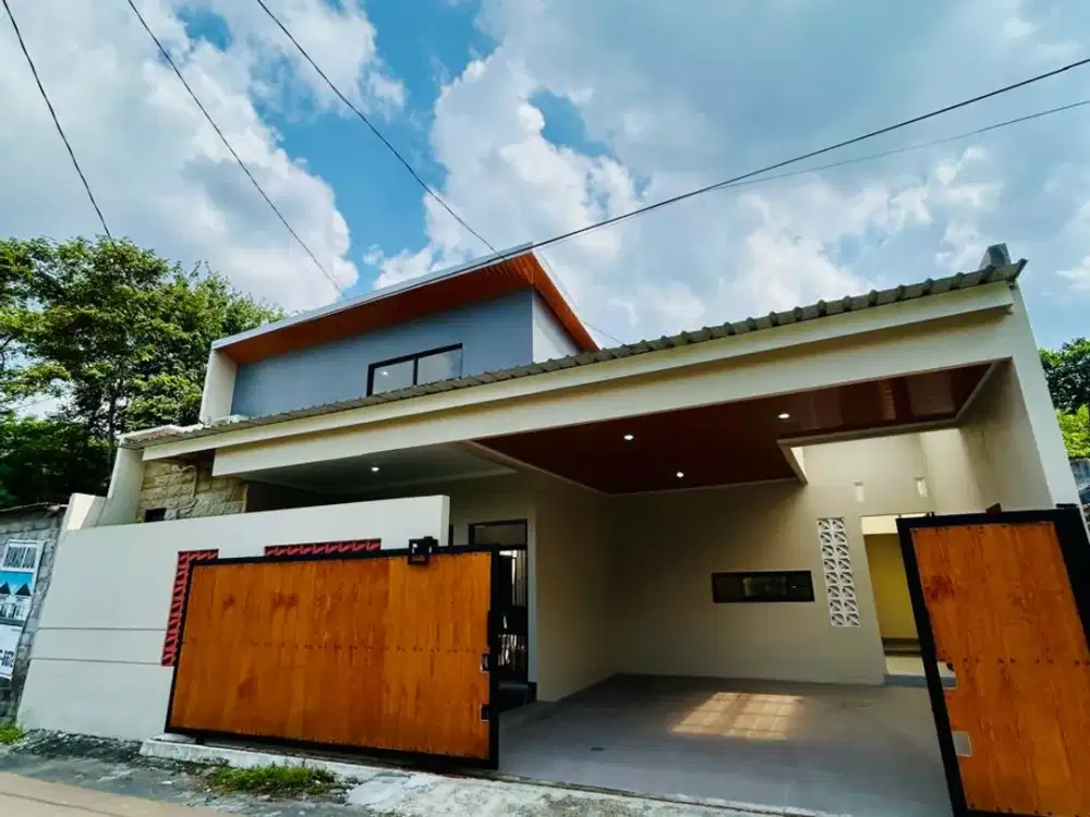 Rumah Tropis Open Space modern kontemporer, posisi HOOK, jalan depan lebar aspal halus lokasi wedomartani sleman yogyakart