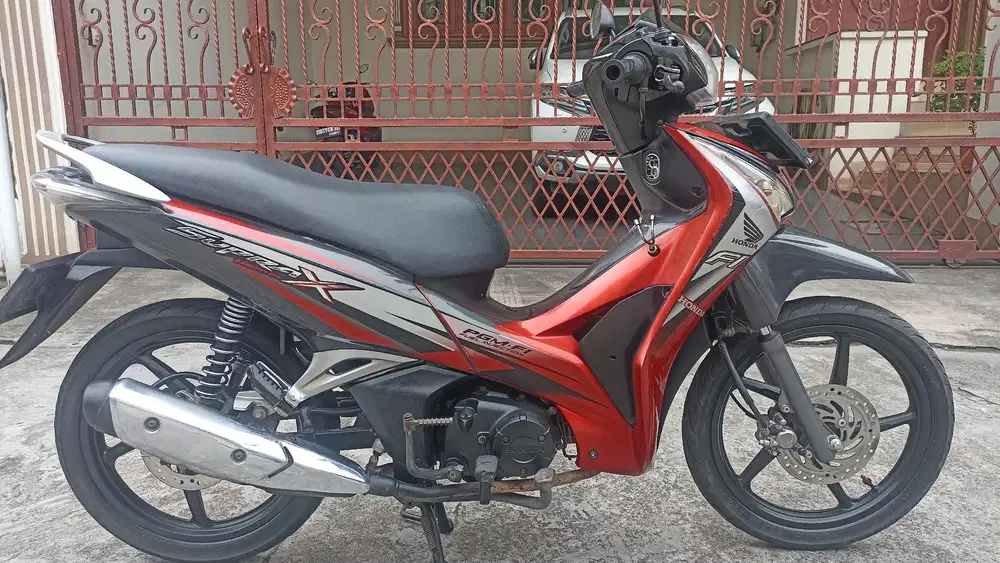 Honda Supra X 125 Helm in tahun 2013.