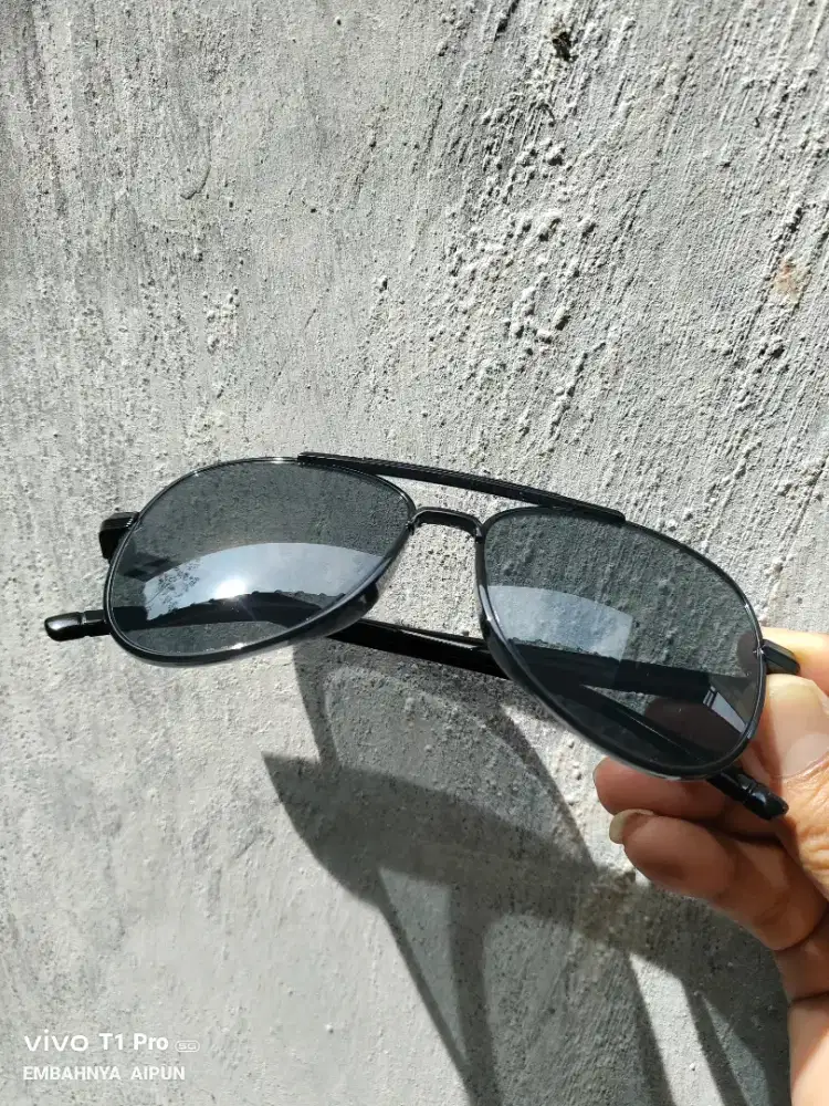 Kacamata elegant maskulin