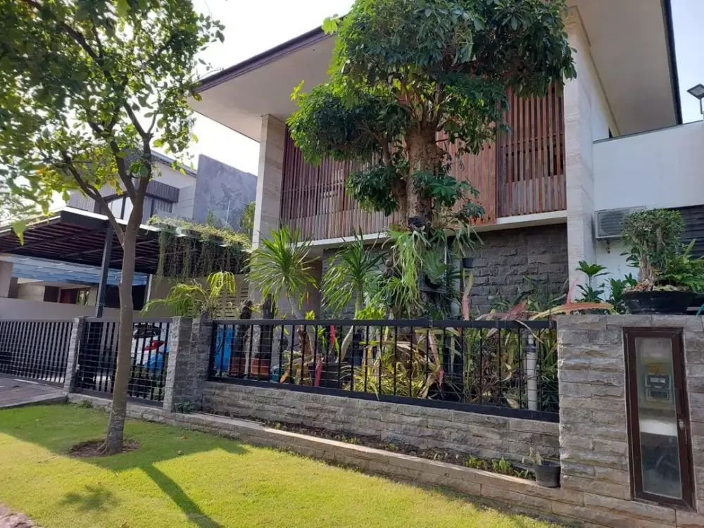 Rumah Graha Natura Modern Tropis