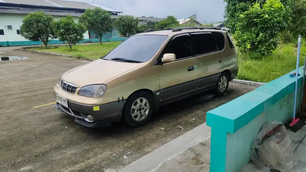 Kia Carens 1 2002 AT