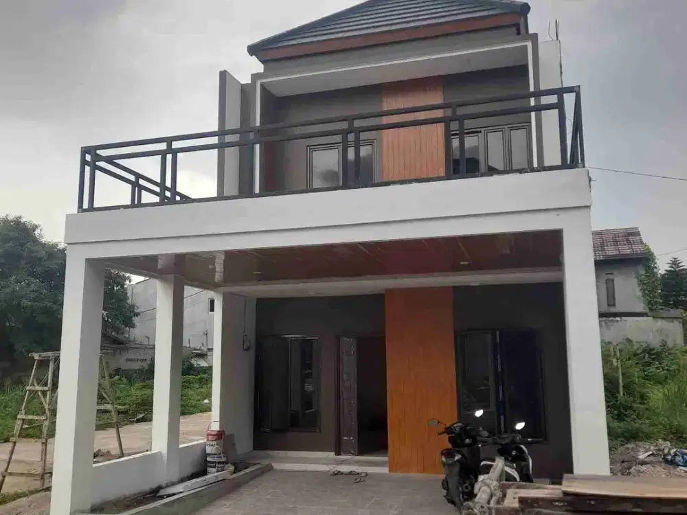 Rumah 2 lantai mewah dengan konsep modern lokasi pinggir jalan raya jatiwarna