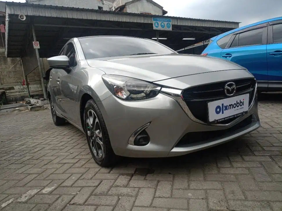 LOW DP Mazda 2 1.5 R Skyactiv Bensin-AT 2015 NIP