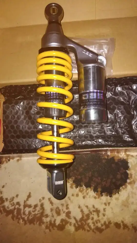 Shock belakang merek DBS