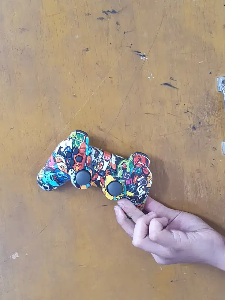 Ps 3 dengan corak kartun yang menarik membuat semua orang tertarik