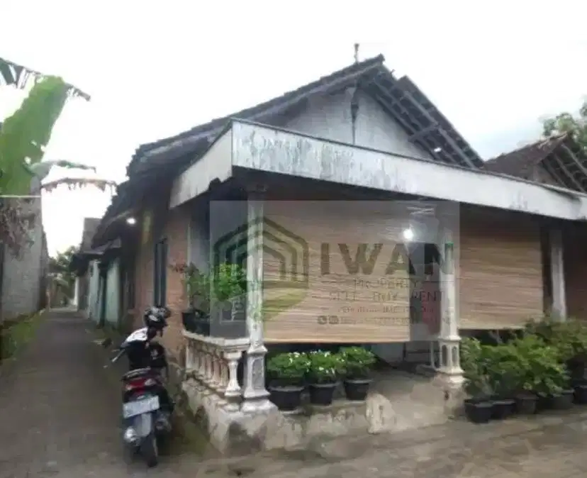 Tanah + Bangunan Strategis Dekat Jalan Raya