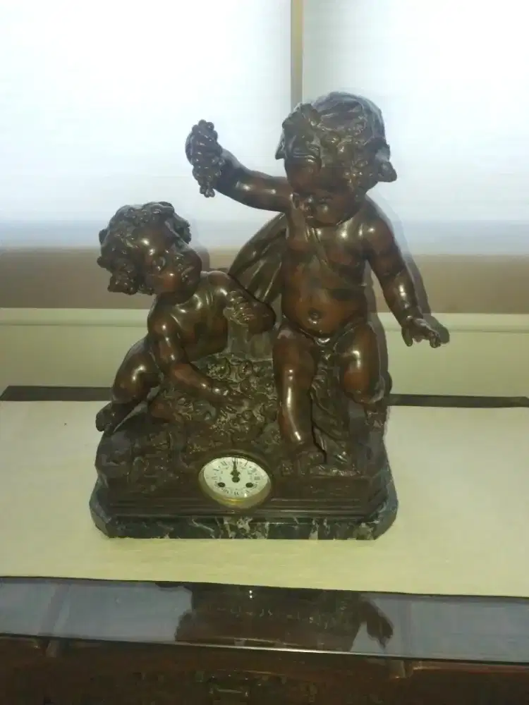 Regulate Clock By J. Castellamare