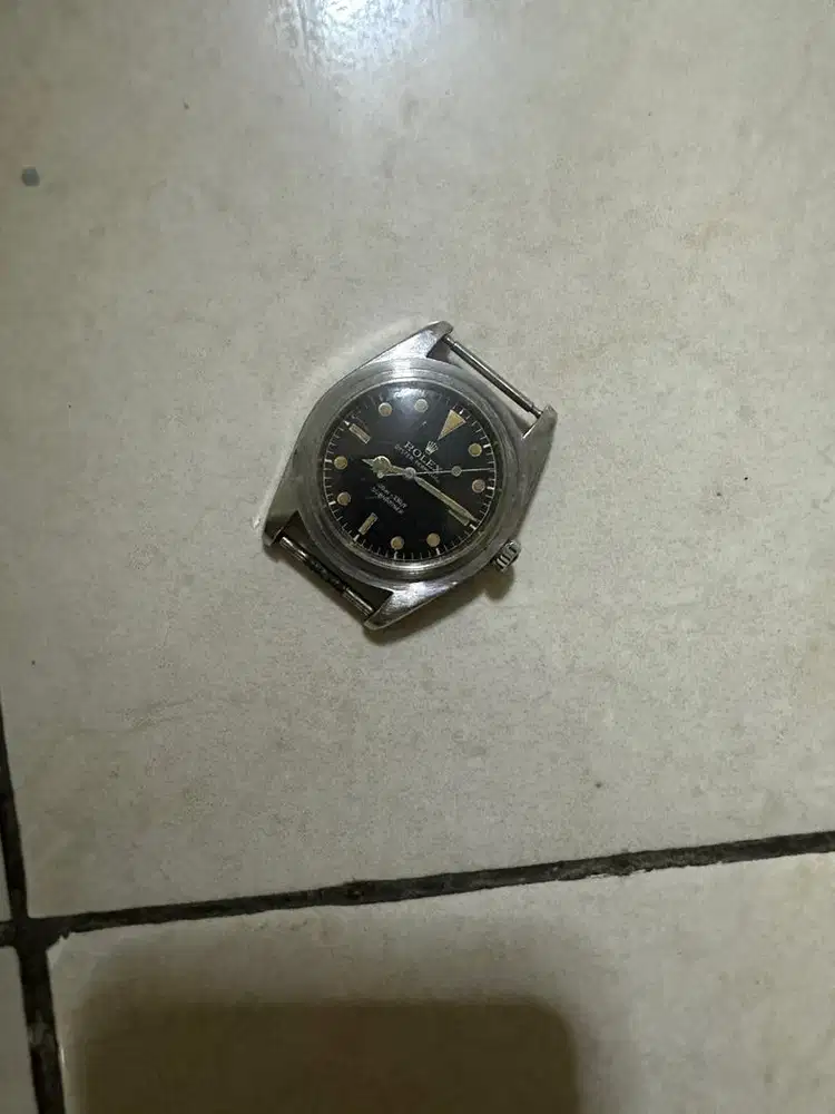 Jam antik merk rolex