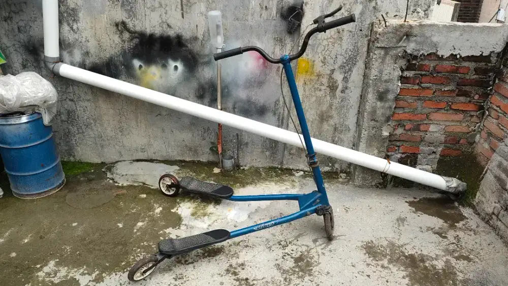 Sekuter lipat roda 3