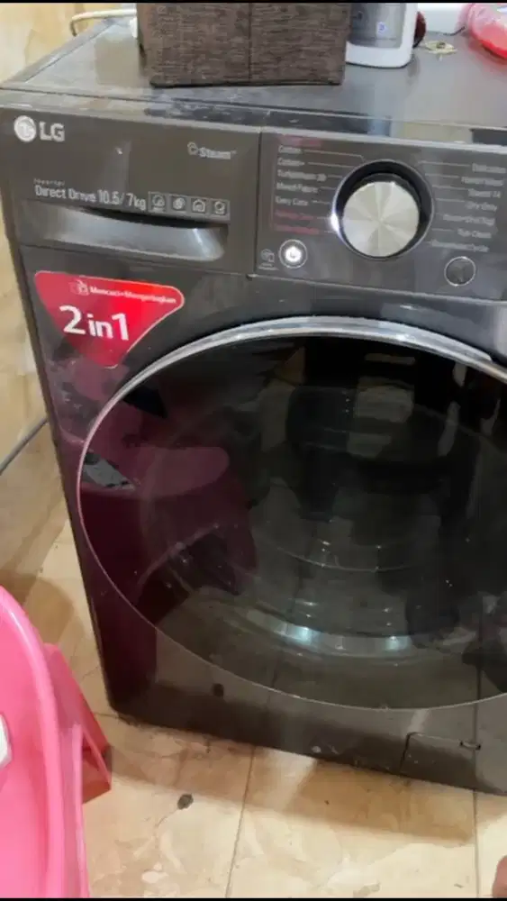 Mesin cuci LG front loading 10,5/7 kg
