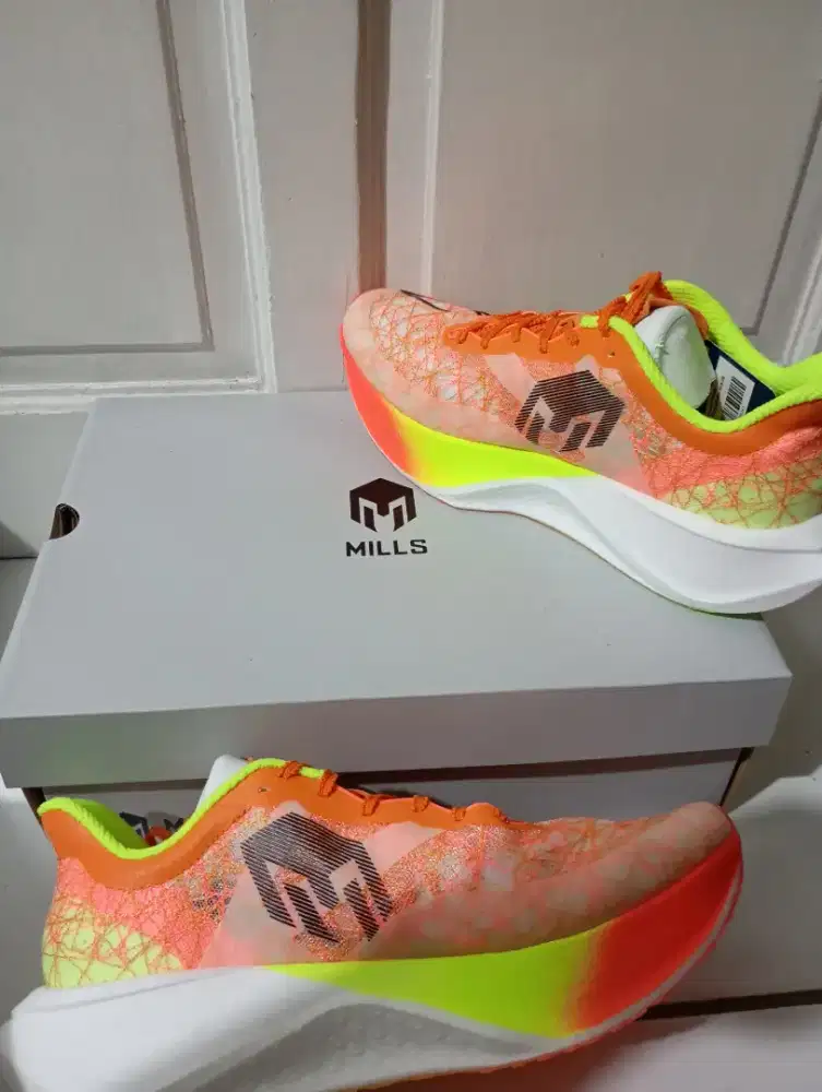 Sepatu running merk MILS original