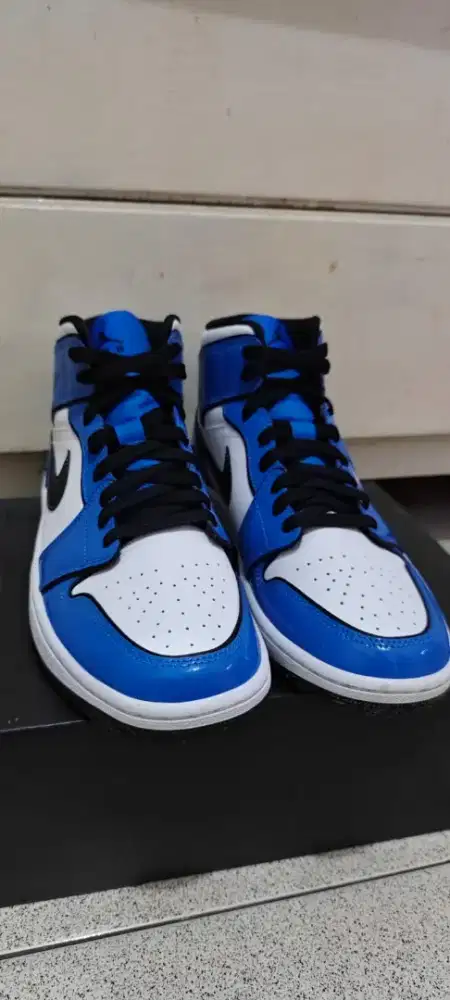 JUAL RUGI AIR JORDAN 1 MID SE BLUE