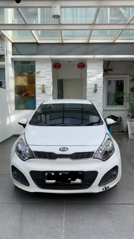 Jual cepat sj kiA RIO putih nik 2013 mulus  km 50rban antik